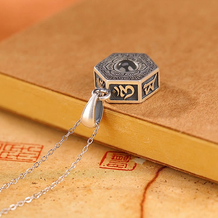 Handmade 990 Sterling Silver Buddhist Pendant with Six-Word Mantra Sanskrit Engravings - Side Oblique Angle