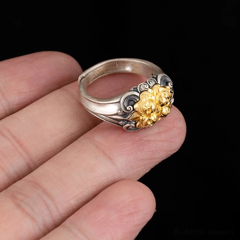 925 sterling silver skull protection ring on human finger showing comfortable fit and embossed detail