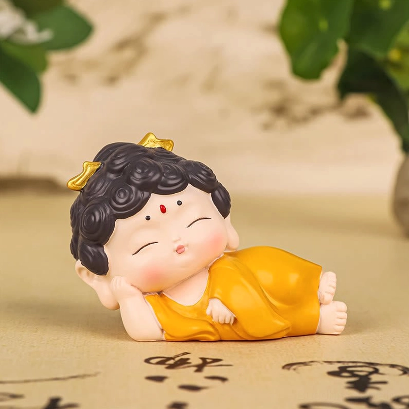Sleeping Buddha reclining resin statue showcasing peaceful rest pose and spiritual tranquility