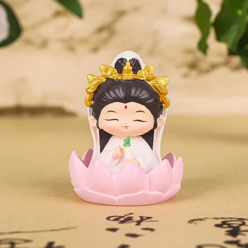 Small compact Avalokitesvara statue on lotus seat for meditation altar or desk