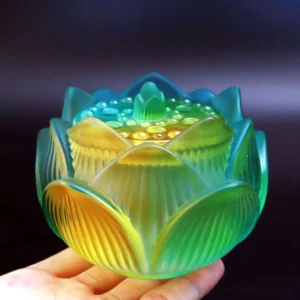 Small Gradient Lotus crystal incense burner in hand, overhead view showing blue-green-yellow gradient frosted glass with carved petal details