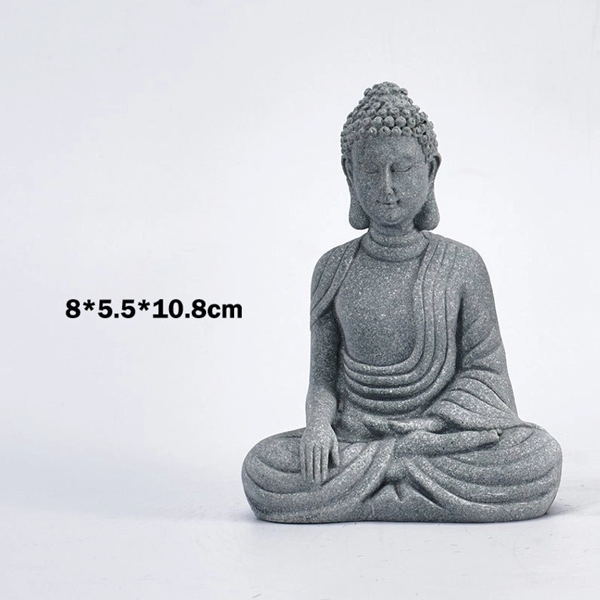 Small natural sandstone sitting Buddha statue measuring 8x5.5x10.8cm, grey stone texture detail view on white background
