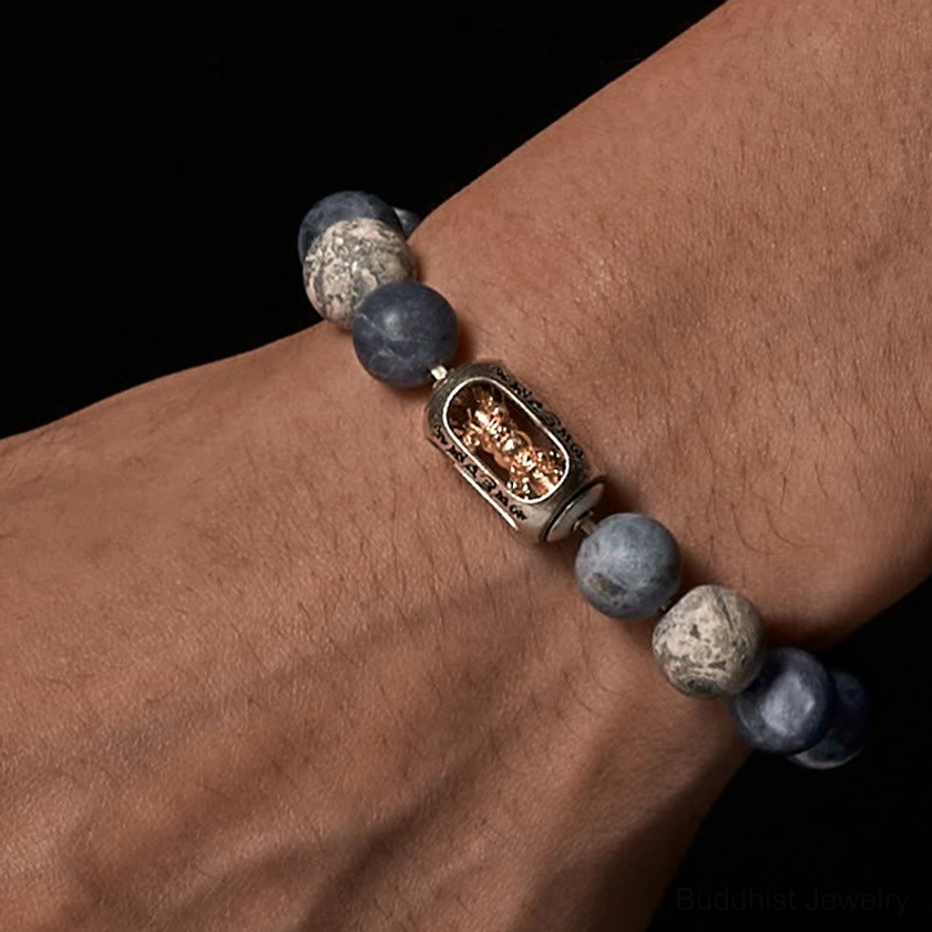 Om Mani Padme Hum Buddhist bracelet worn on wrist showing comfort fit and natural stone texture