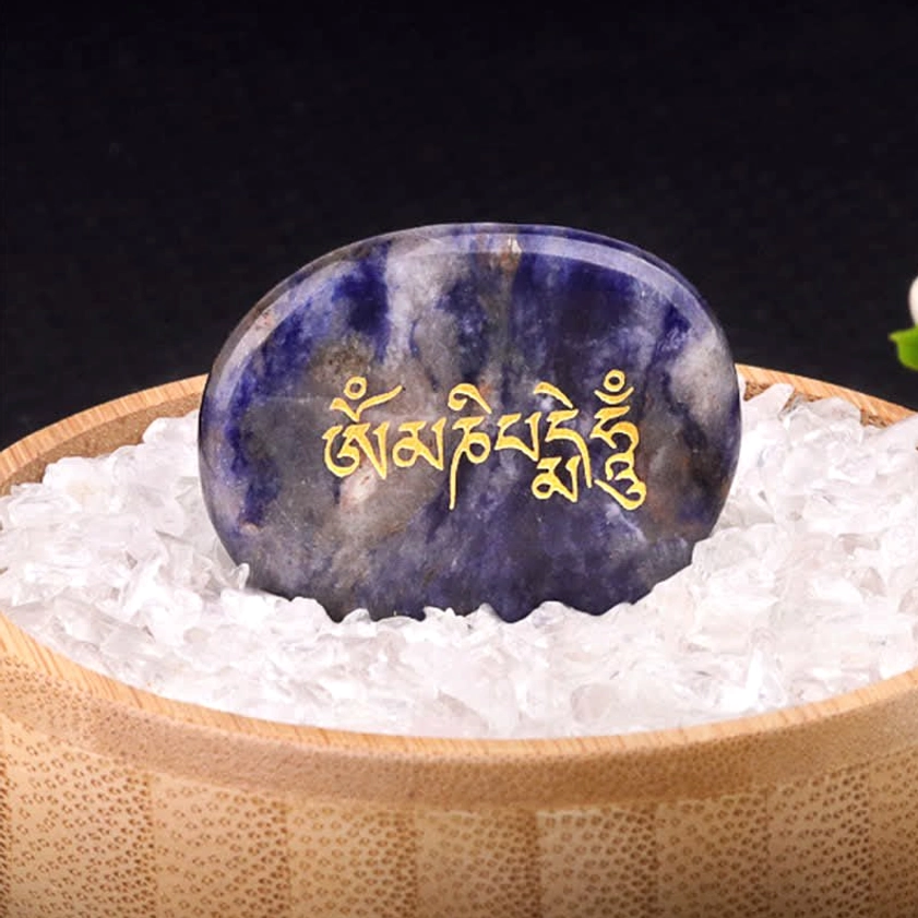 Om Mani Padme Hum sodalite palm stone with golden Sanskrit text detail