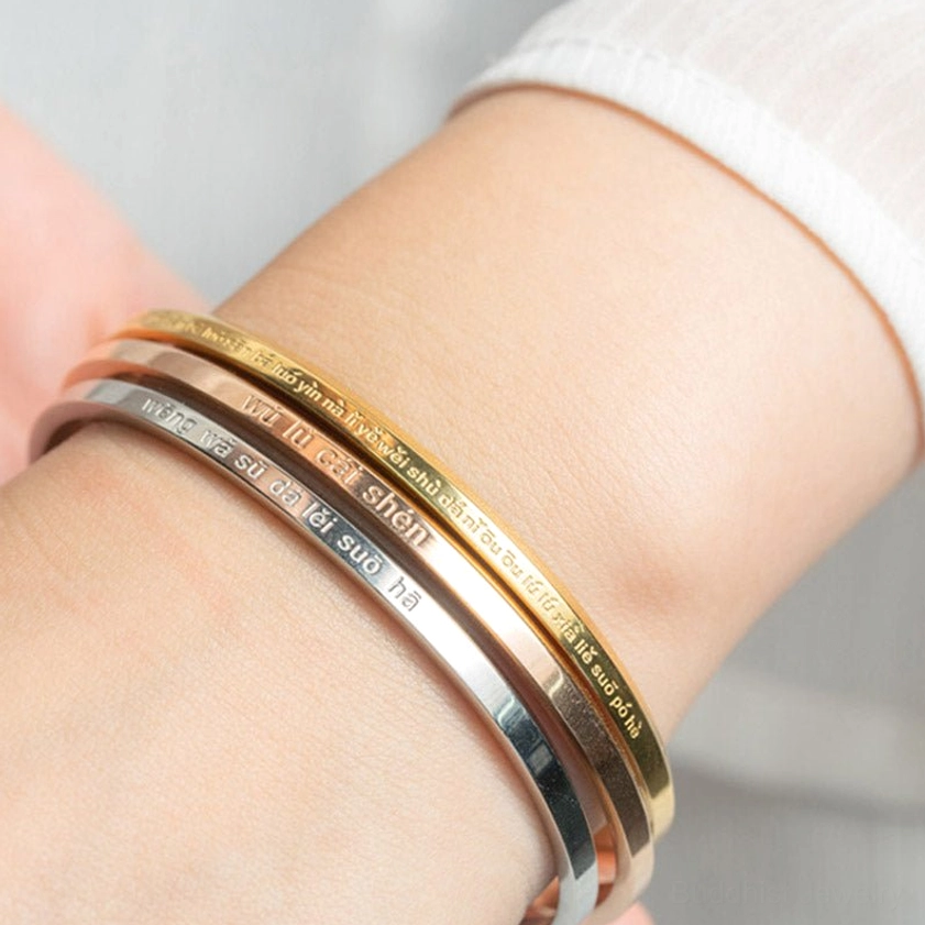 Sacred mantra bracelets worn on wrist in gold silver and rose gold