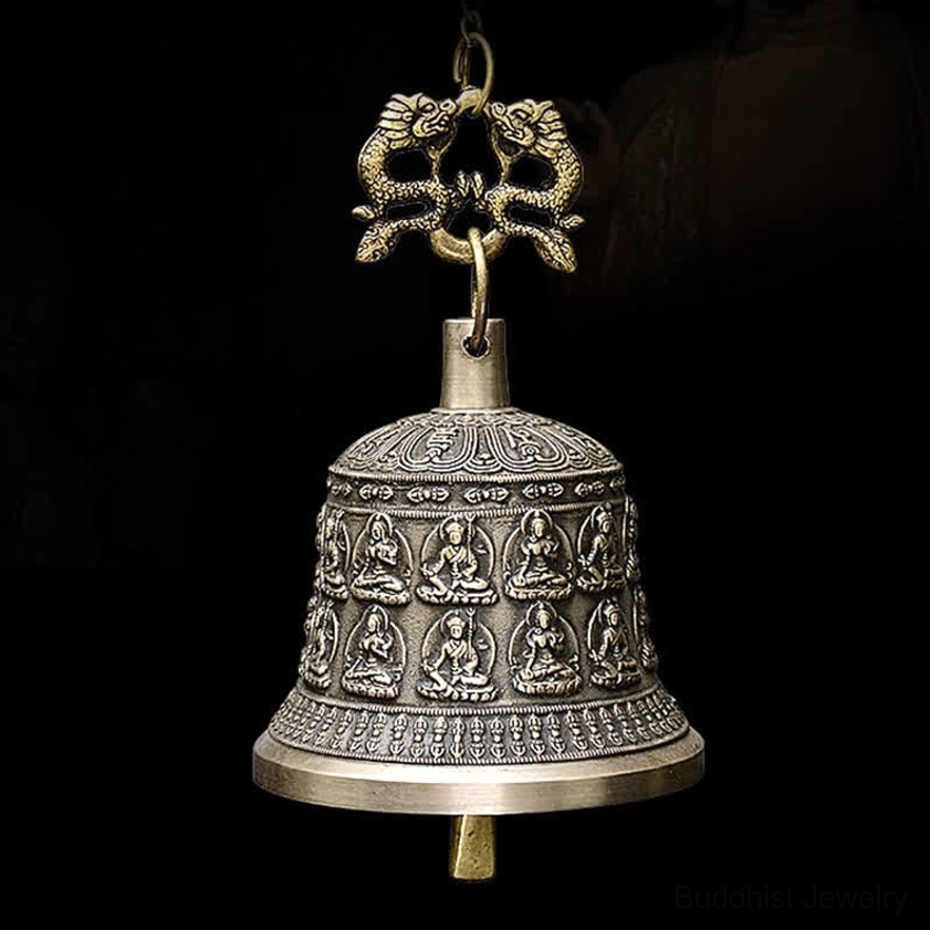 Tibetan style Buddha wind chime bell with protective dragon hanging hook and embossed sacred patterns