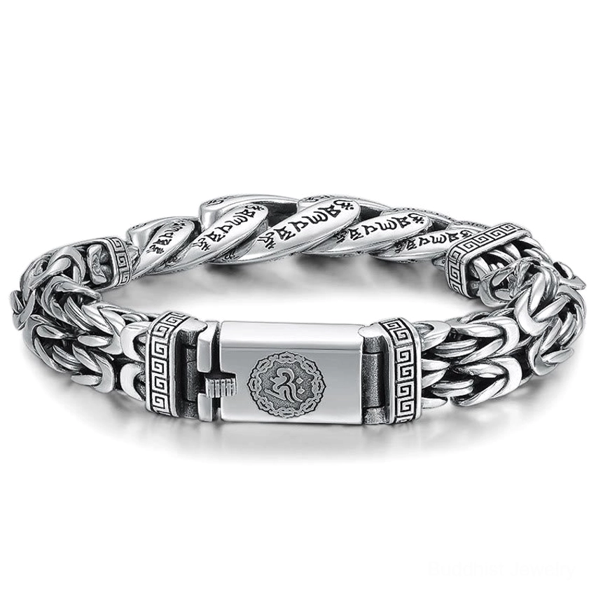Buddhist mantra bracelet front view with central decorative clasp and woven curb chain on neutral background