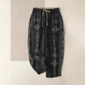 Women's spiritual harem pants with lotus vajra namaste om print, black organic cotton flat lay front view