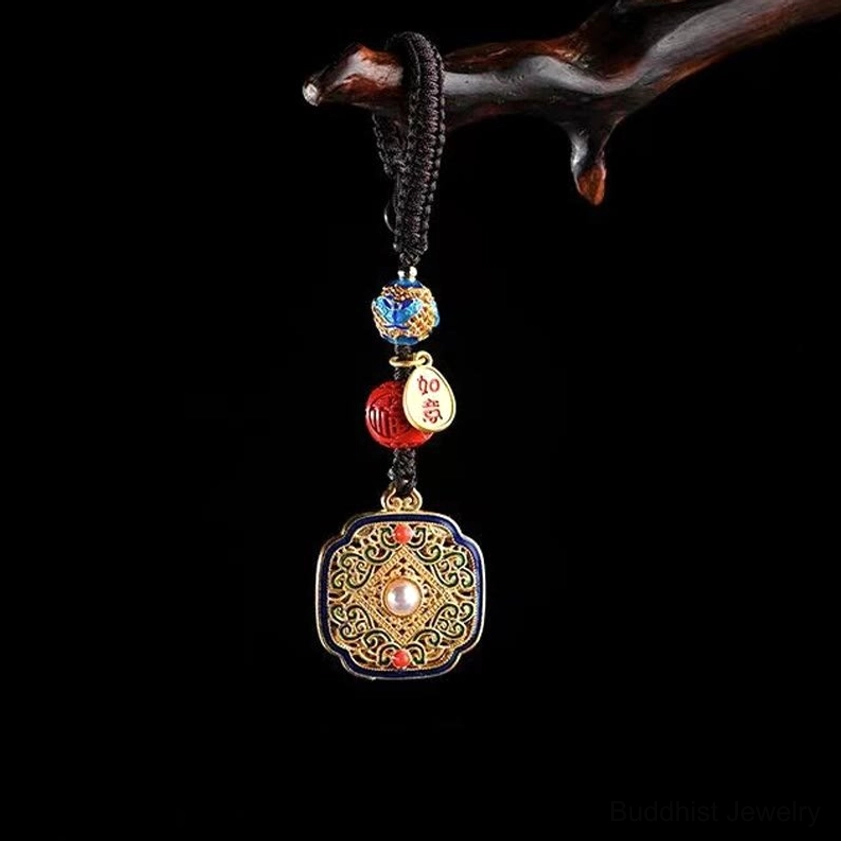 Square filigree Fu character blessing keychain pendant hanging with auspicious metal tag on wooden display prop