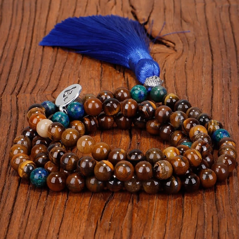 Stacked tiger eye and blue gemstone mala bracelets with Buddha charm