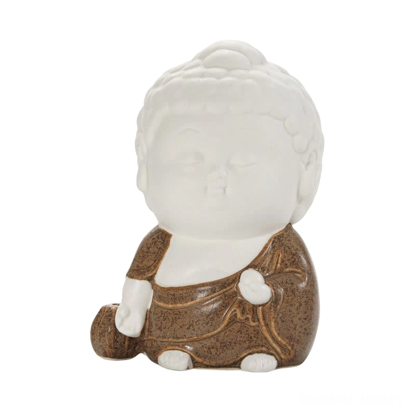 Standing Buddha ceramic figure in protective strength pose - side profile view showing celadon robe detail