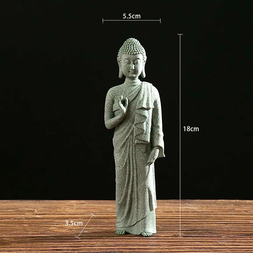 Standing Buddha statue with right hand teaching gesture in natural green sandstone