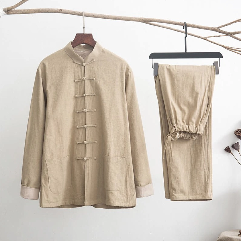 Steel blue zen tang suit shirt detail showing stand collar and frog button closure for authentic meditation practice