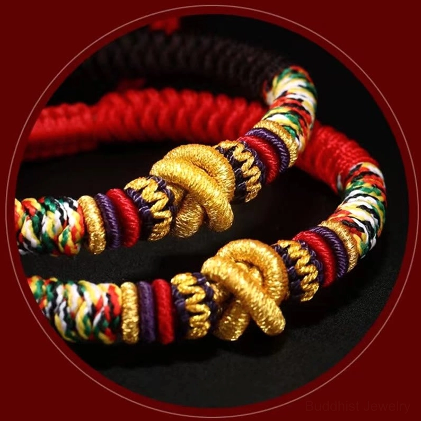 Red rope Buddhist bracelet with silver Om Mani Padme Hum charm for compassion and inner peace