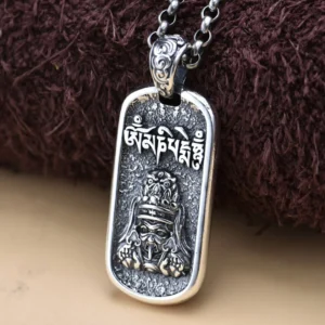 Sterling silver Om Mani Padme Hum wealth goddess pendant necklace with engraved mantra, front oblique view