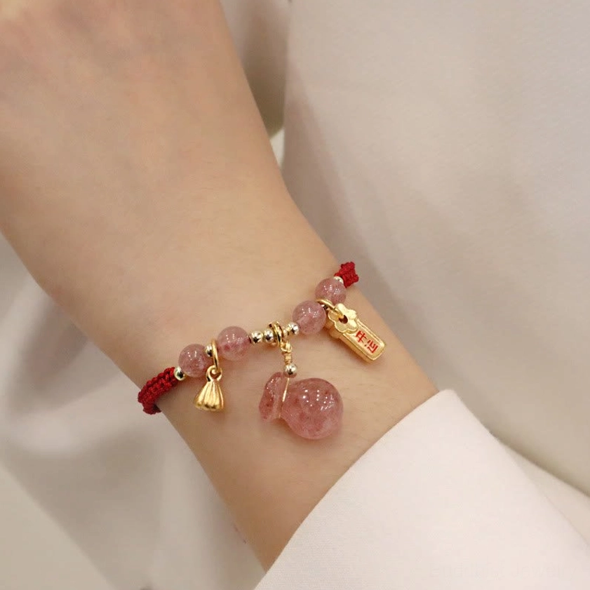 Handcrafted Red String Bracelet with Strawberry Quartz Pendant Worn on Wrist - Close-Up Detail Shot
