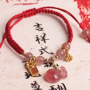 Strawberry Quartz Lotus Red String Bracelet for Love and Healing - Flat Lay with Chinese Calligraphy Background