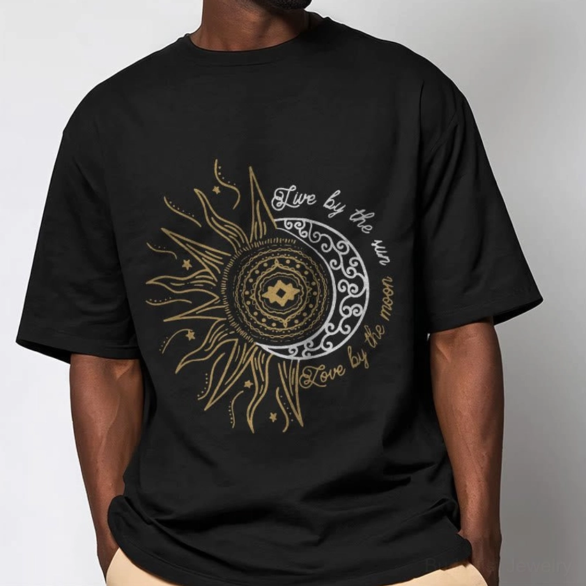 Male model wearing spiritual sun moon graphic Buddhist t-shirt with celestial print, casual street style