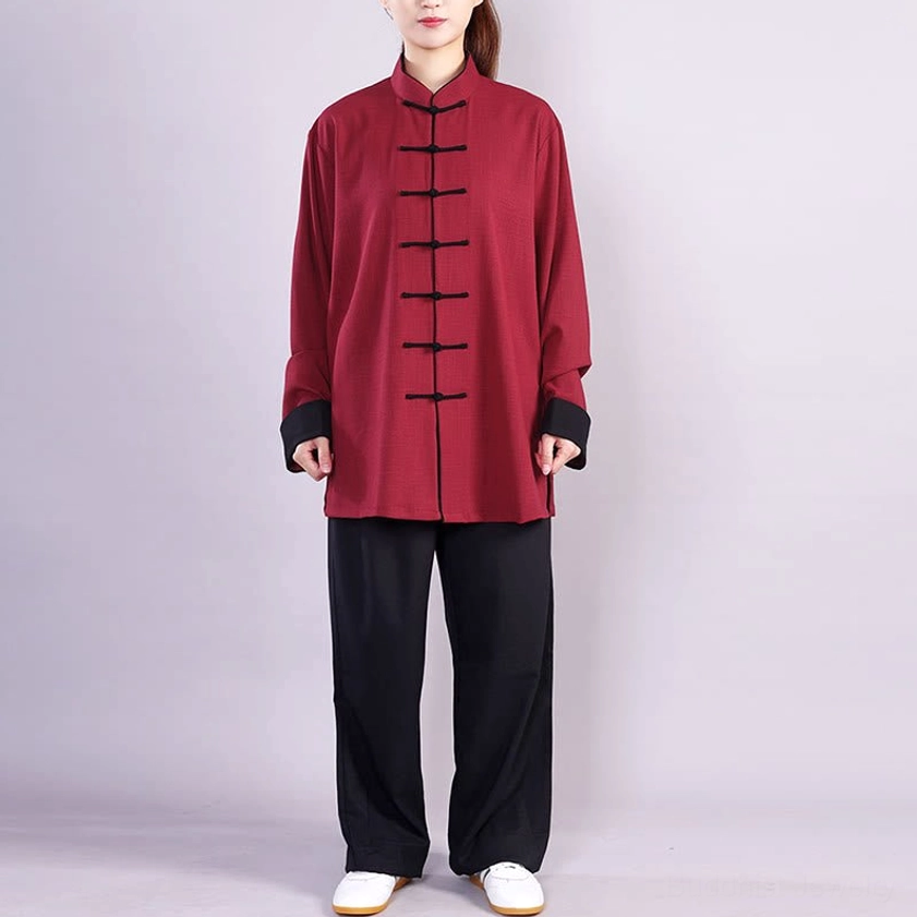 Tai chi meditation practice outfit red top and black pants, minimalist neutral display showing fabric drape and fit