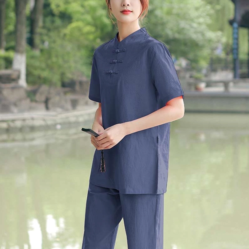 Premium cotton-linen fabric texture detail showing breathable weave for comfortable tai chi and meditation practice