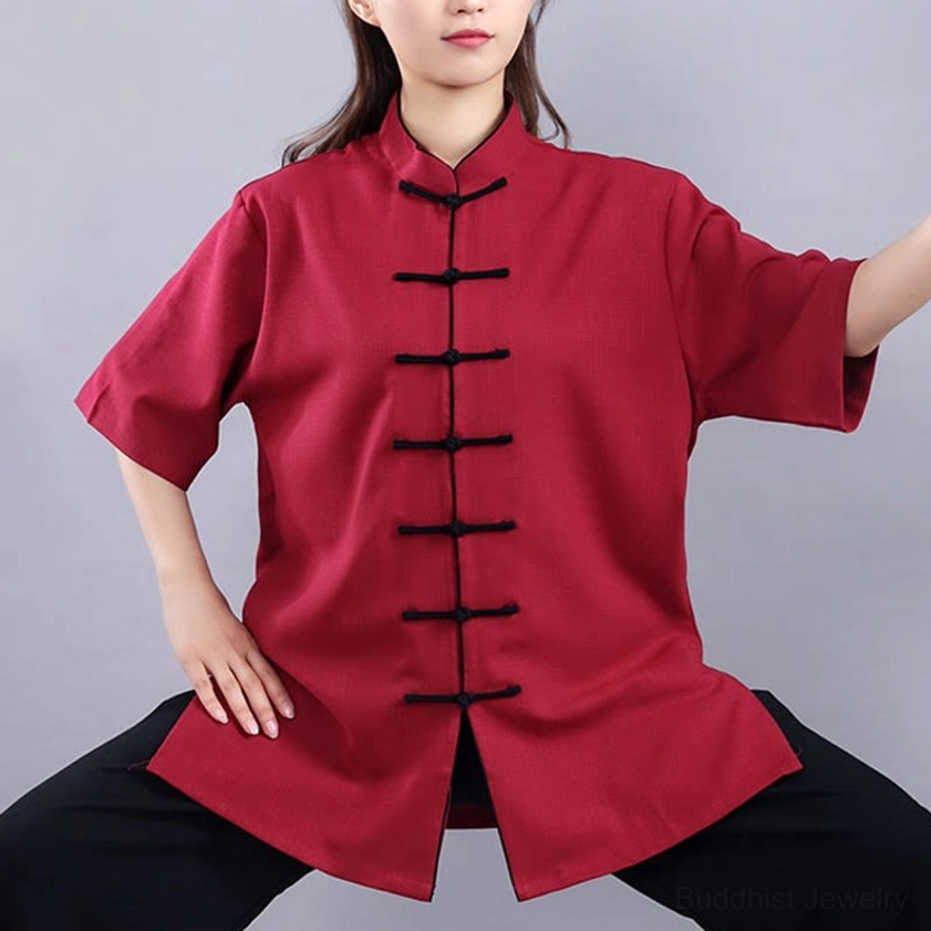 Tai chi meditation outfit frog button and mandarin collar detail on maroon linen-cotton top, craftsmanship closeup