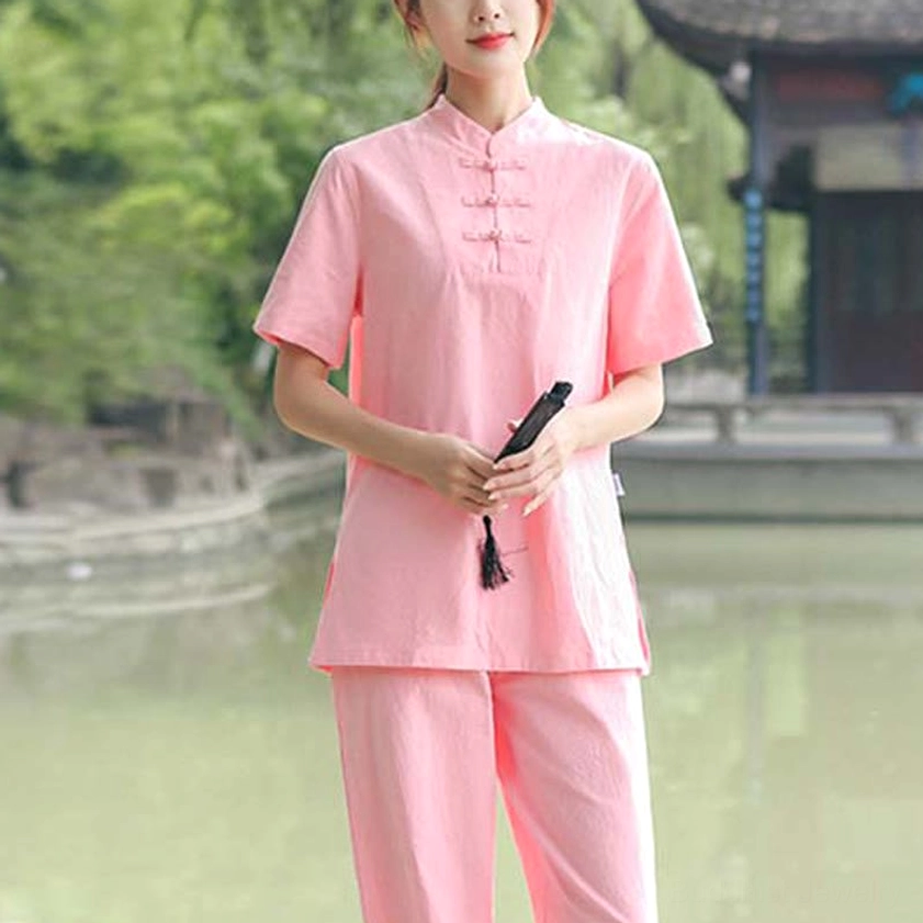 Tai chi clothing set showing authentic stand collar frog button design and loose-fit silhouette for spiritual practice