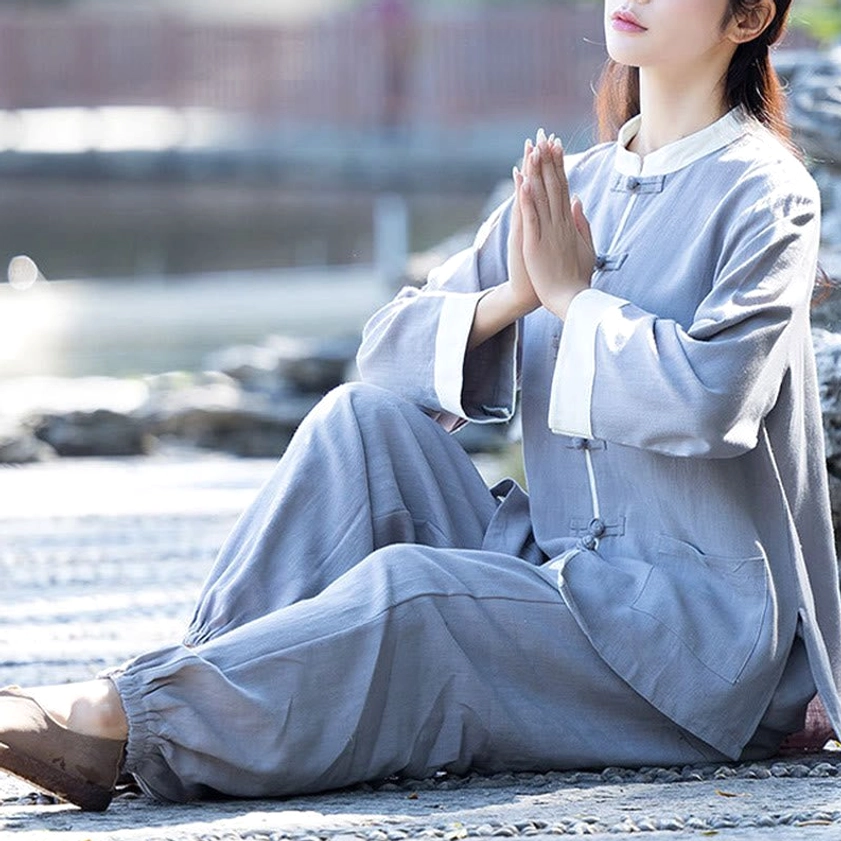 Tai chi uniform for women, size chart and fit guide showing measurements in US, UK, EU and metric dimensions