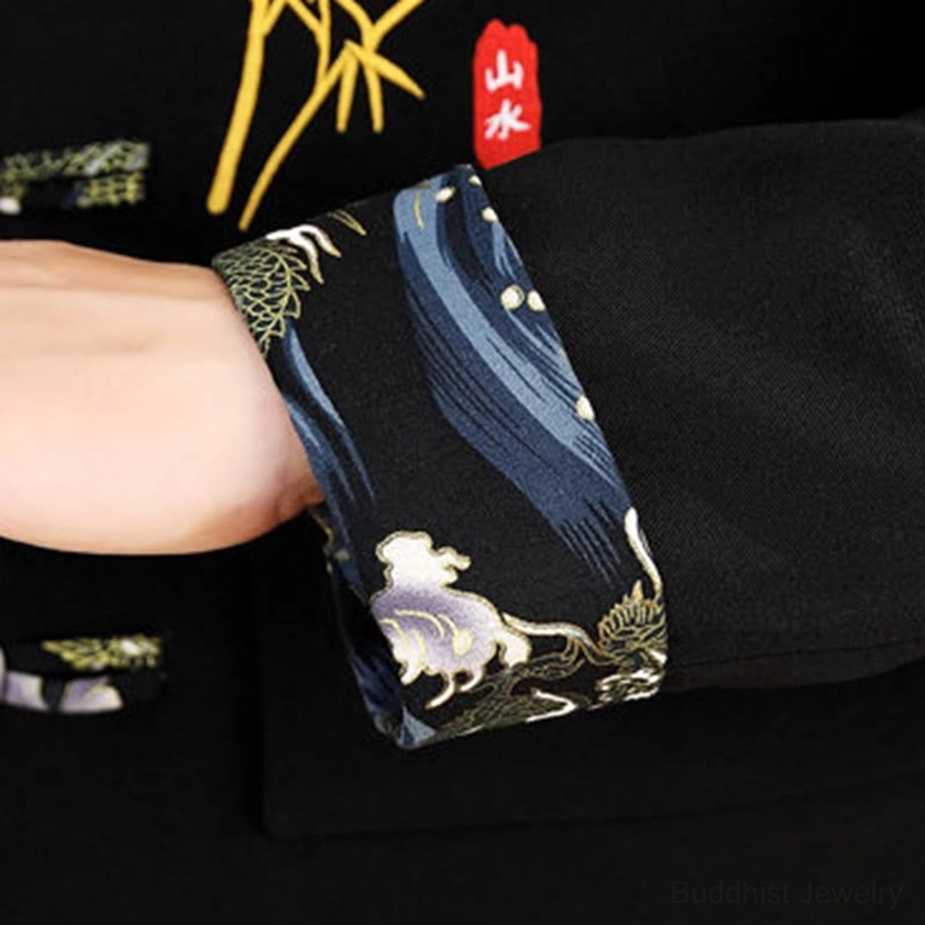 Tang suit cuff side view - intricate decorative pattern and traditional craftsmanship detail