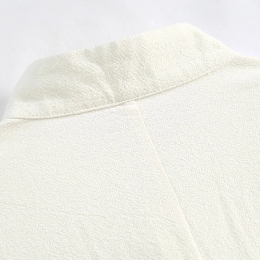 Tang suit fabric blend swatch showing 45% cotton 55% linen natural fiber composition