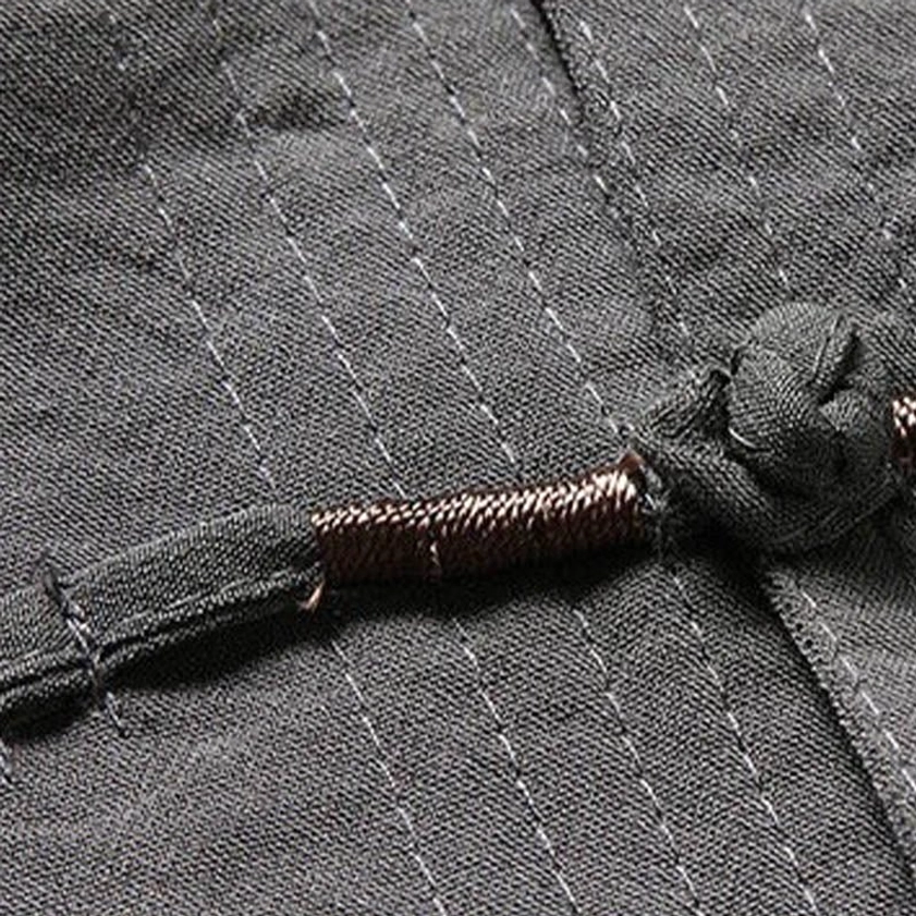 Tang suit hand-twisted frog button with wrapped cord detail - close-up macro view of traditional Chinese closure