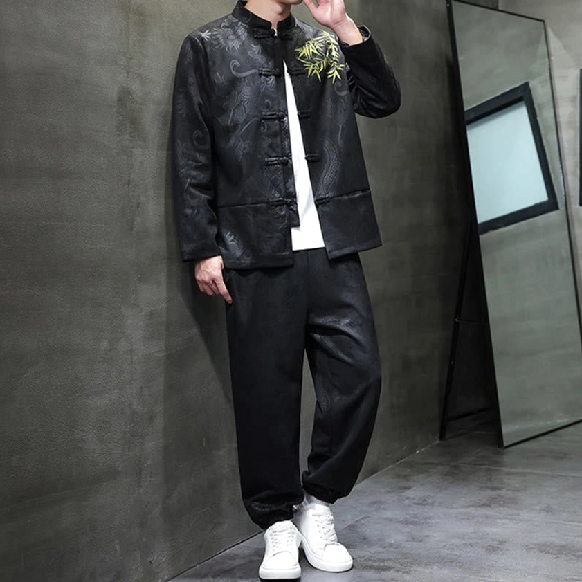 Tang suit front view showing jacket fit and bamboo embroidery prominence