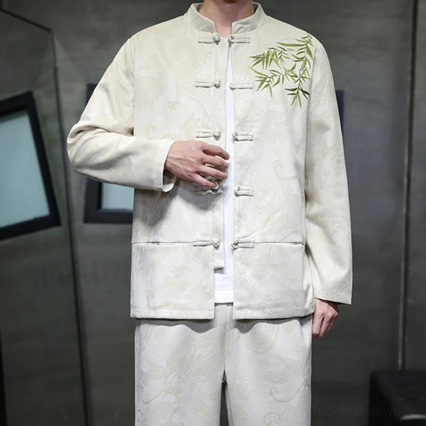 Front close-up of Tang suit jacket showing frog button design and lower pocket construction