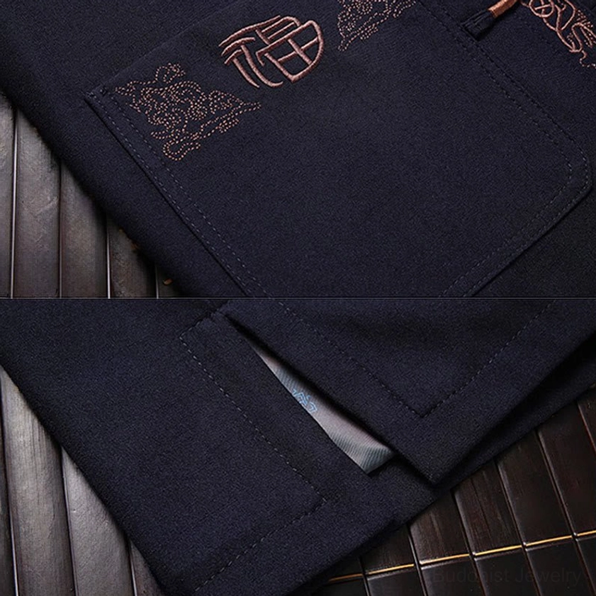 Tang suit jacket pocket with Fu character embroidery and decorative floral trim detail
