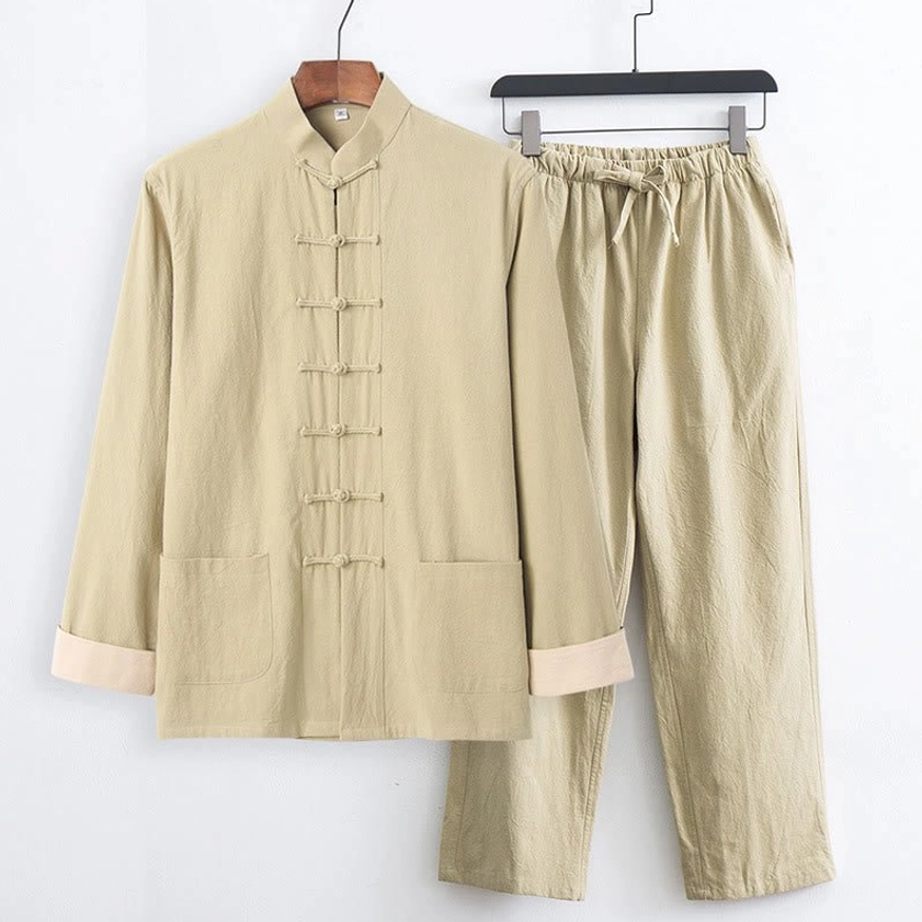 Pale goldenrod Tang suit shirt displayed with black pants showing color contrast and elegant styling