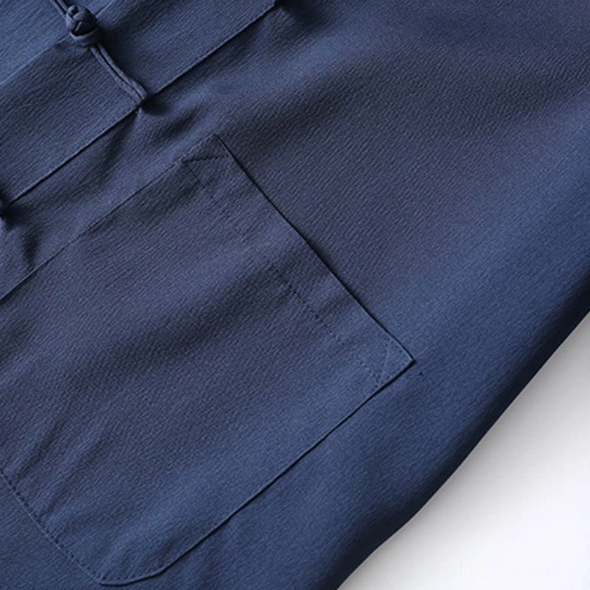 Close-up of tang suit shirt chest patch pocket with clean stitched edges