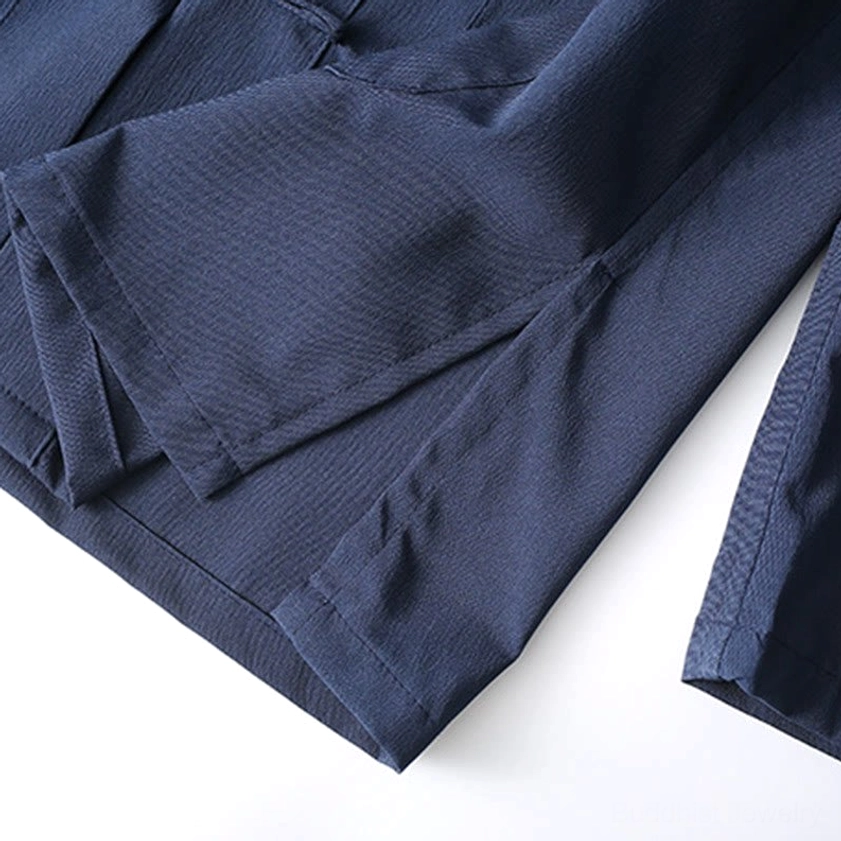 Matching tang suit trousers with straight leg design and natural waistline displayed flat