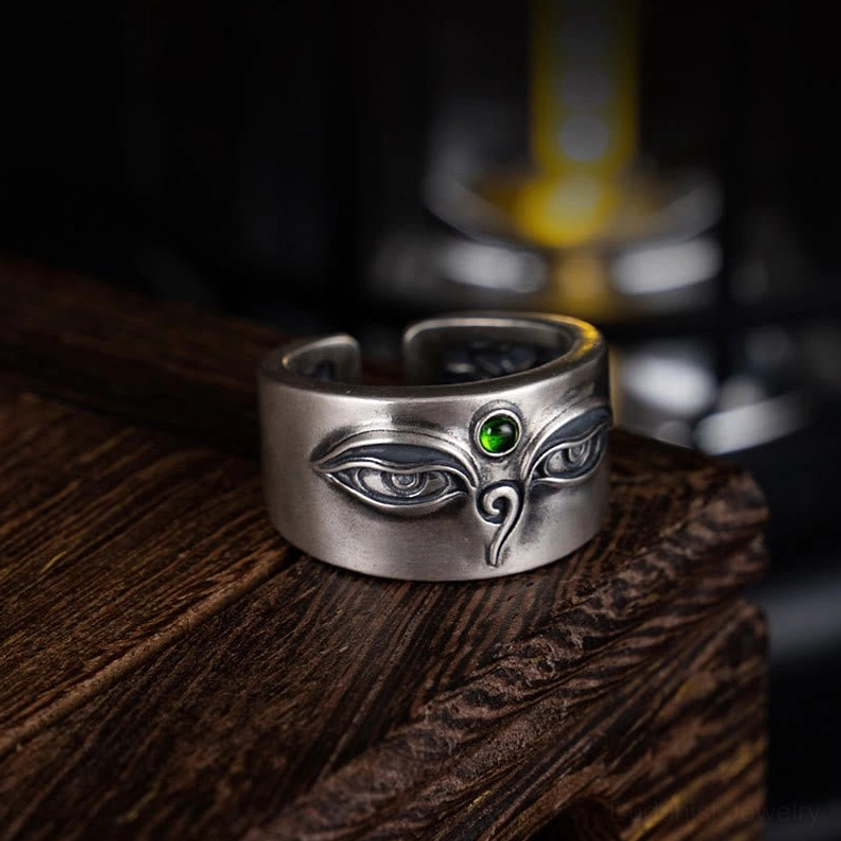 925 sterling silver Tara Buddhist adjustable ring featuring hand-engraved Bodhisattva imagery, green stone accent, and open band design for spiritual protection