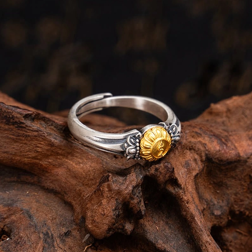 Tara protection ring side close-up showcasing embossed gold Bodhisattva motif on handcrafted silver band