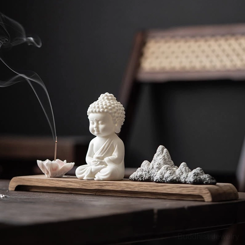 Tathagata Buddha ceramic incense burner with lotus holder on wooden tea table, Zen meditation decor