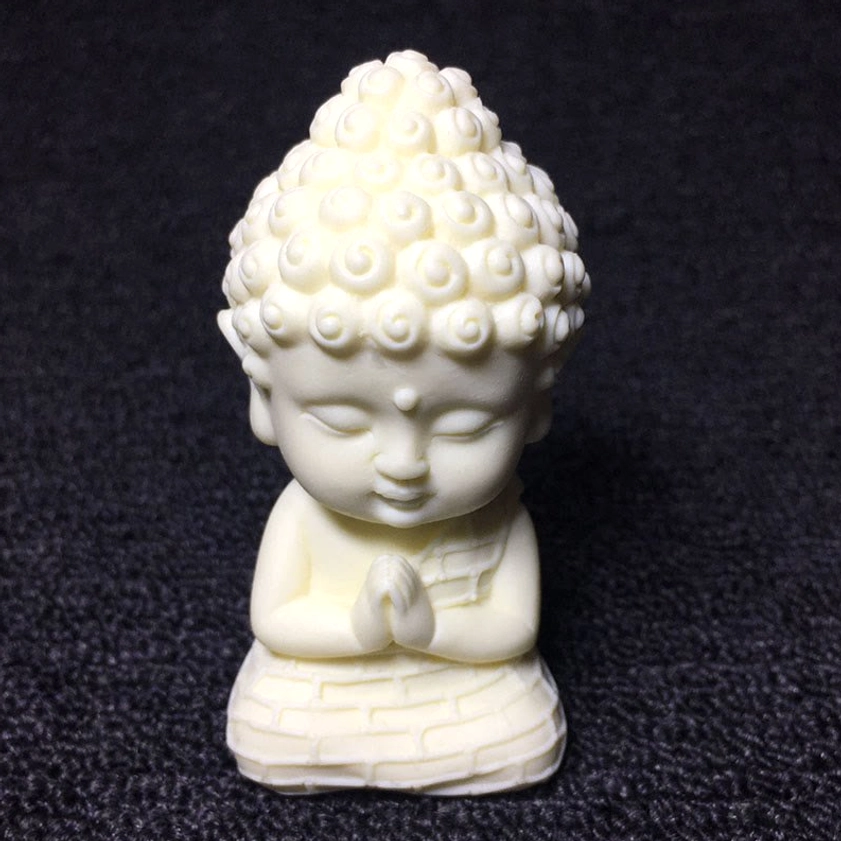 Tathagata Buddha 8.5x4.5x4.5cm - handcrafted ivory fruit meditation statue