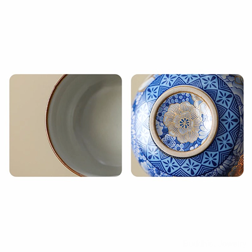 Split detail shot showing glazed inner surface and bottom gilt floral pattern of porcelain tea cup