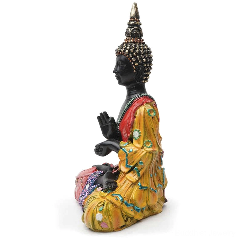 Thai Buddha resin statue right three-quarter view with dominant golden robes and prayer hand gesture