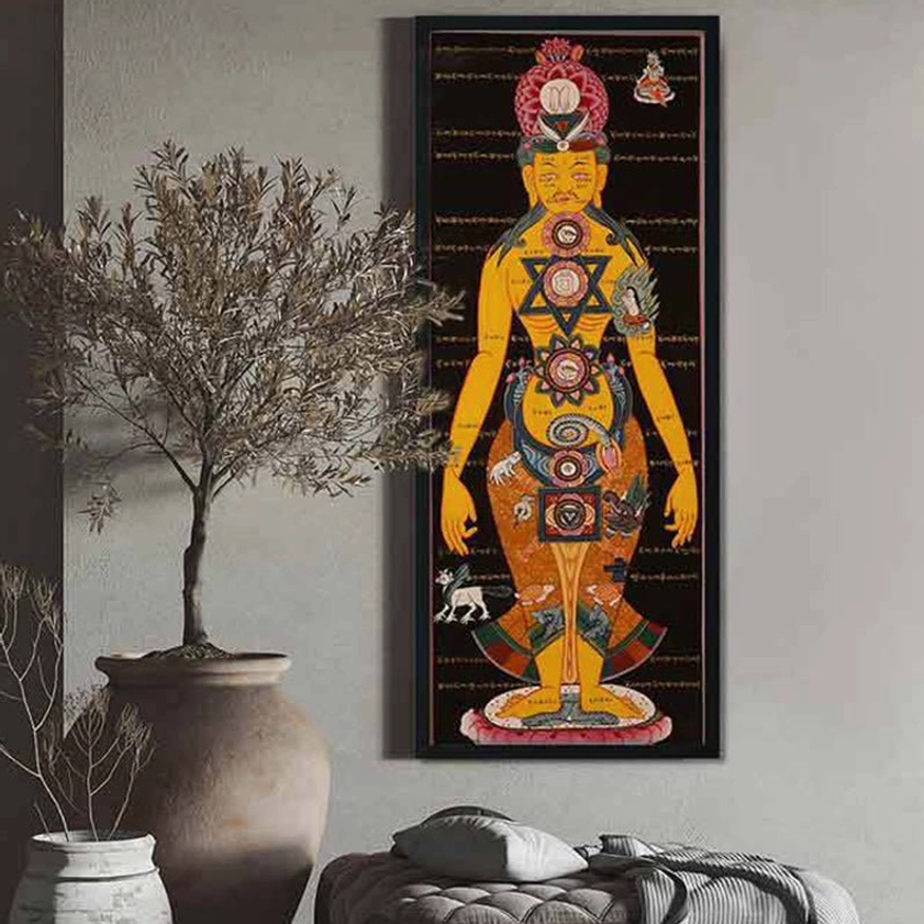 Sacred thangka scroll decoration in contemporary wabi-sabi style bedroom with ceramic planter and soft furnishings