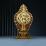 Thousand-armed Avalokitesvara bronze statue front view with ornate thousand-hand backdrop and decorative pedestal
