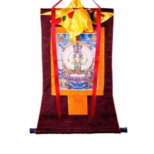 Thousand-armed Avalokitesvara thangka with golden brocade frame and red silk hanging ribbons on white background