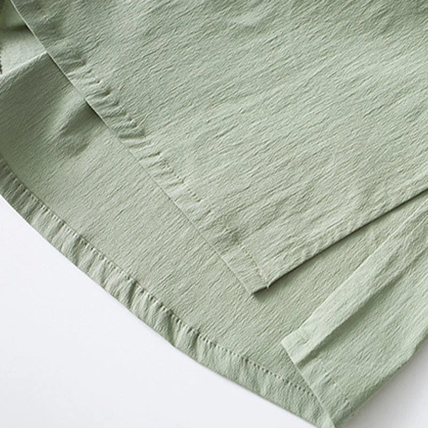 Men's Buddhist meditation suit three-quarter sleeve detail showing comfortable arm movement for yoga tai chi and spiritual practice