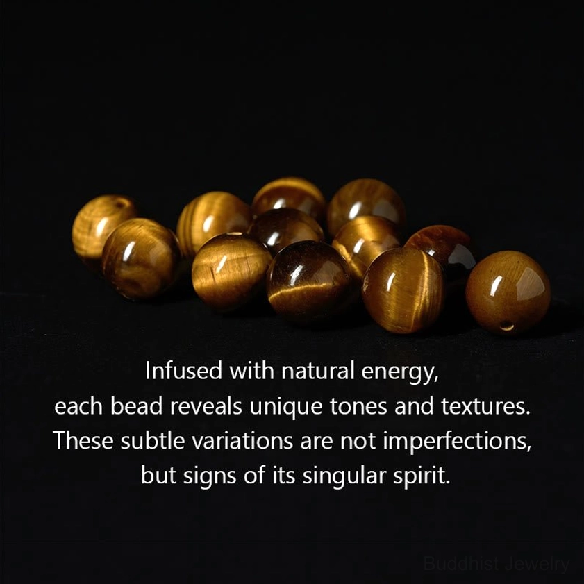Loose brown tiger eye beads with golden tones and cat-eye stripe texture for spiritual bracelets