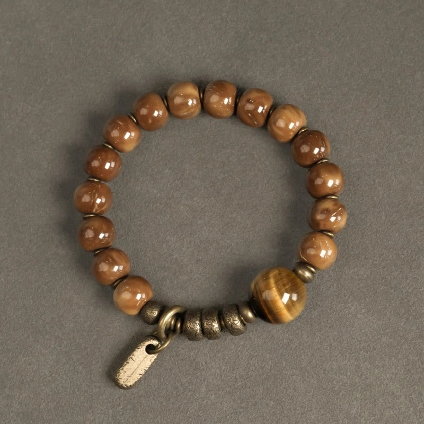 Round tiger eye bead stretch bracelet with vintage metal accents detail shot