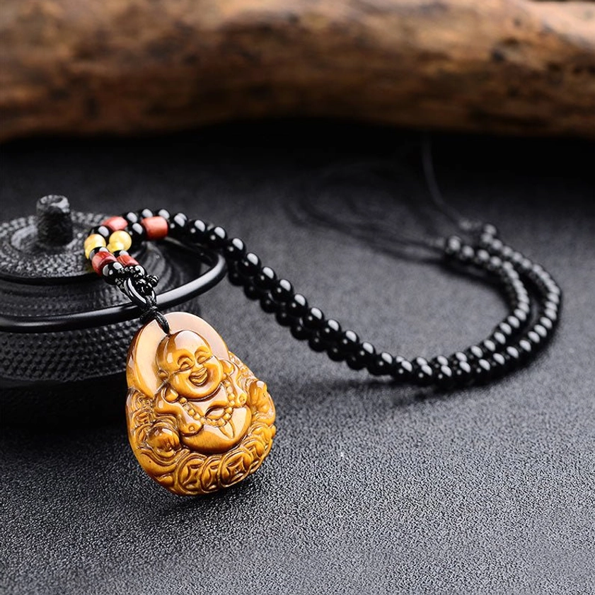 Tiger's eye Buddha necklace full set with black beaded cord and red wooden bead accents coiled display