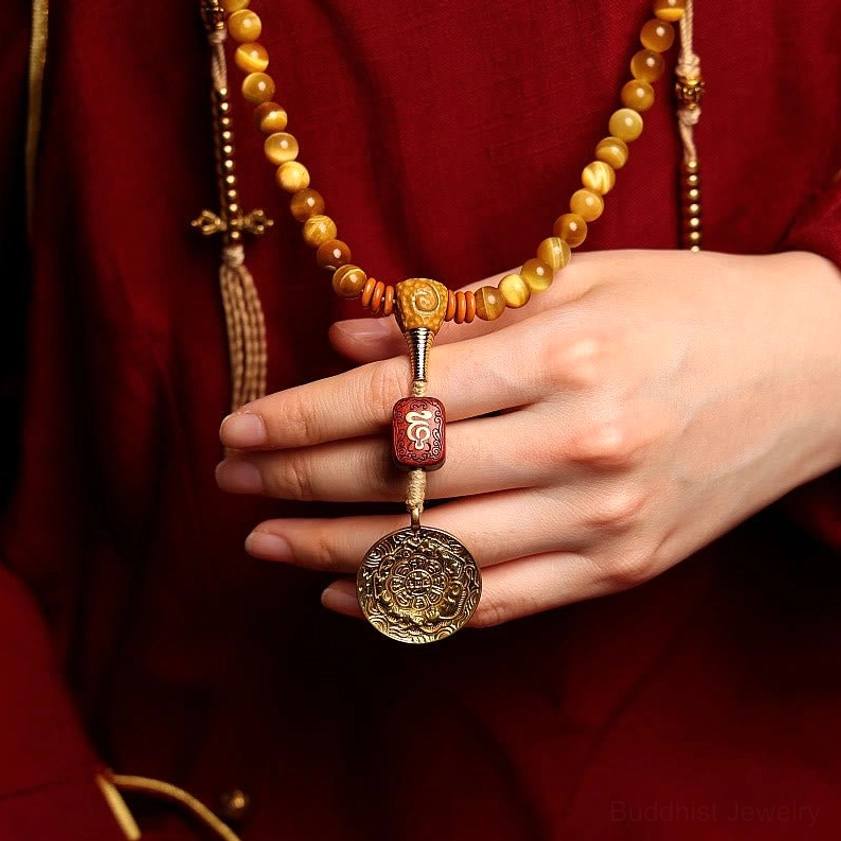 Tiger Eye prayer mala beads necklace with round metal medallion pendant and carved wooden bead accent